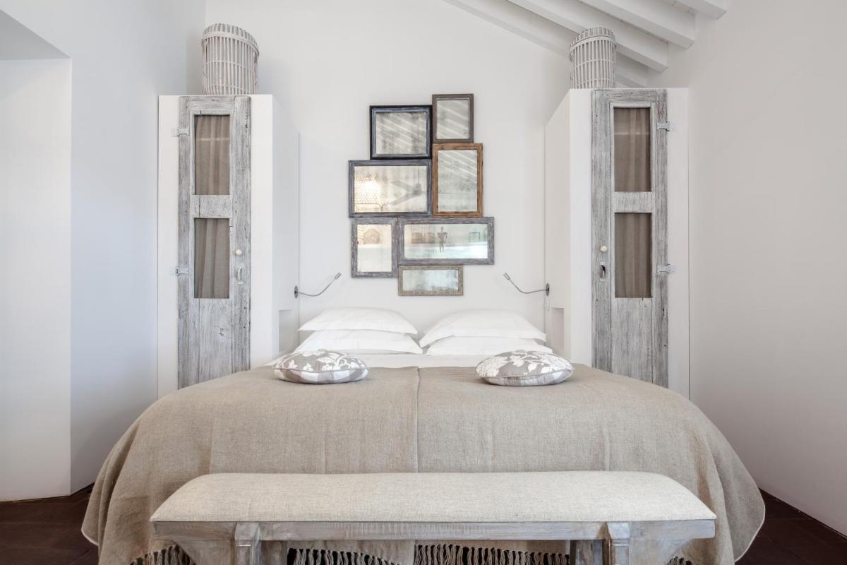 Uma cama ou camas num quarto em Torre de Palma Wine Hotel, Monforte, a Member of Design Hotels