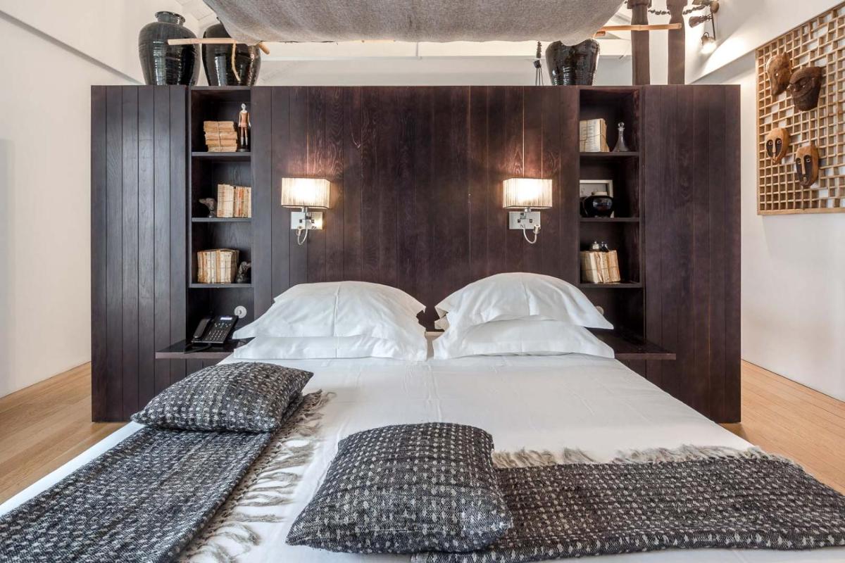 Uma cama ou camas num quarto em Torre de Palma Wine Hotel, Monforte, a Member of Design Hotels