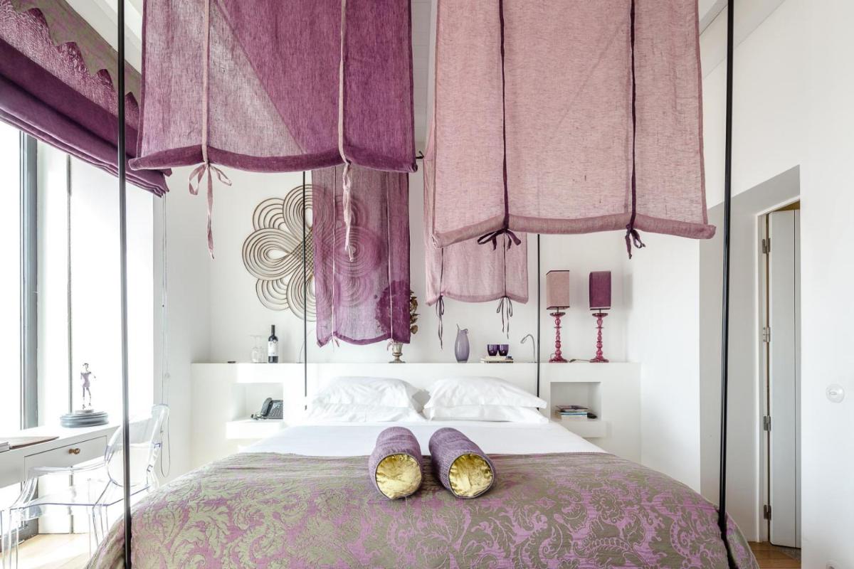 Uma cama ou camas num quarto em Torre de Palma Wine Hotel, Monforte, a Member of Design Hotels