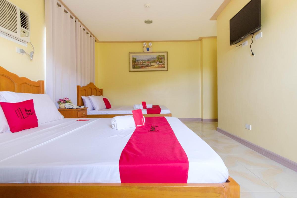 RedDoorz Plus @ Manalo Extension Palawan - Housity