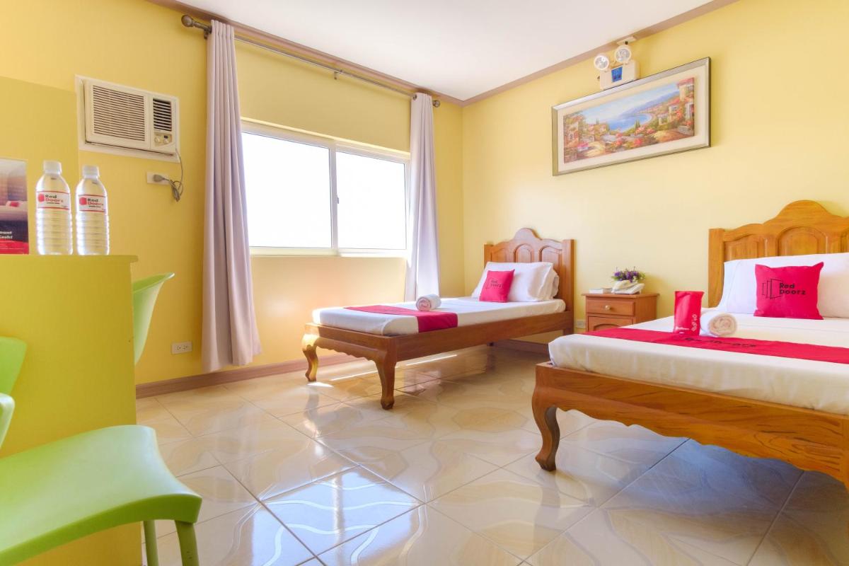 RedDoorz Plus @ Manalo Extension Palawan - Housity