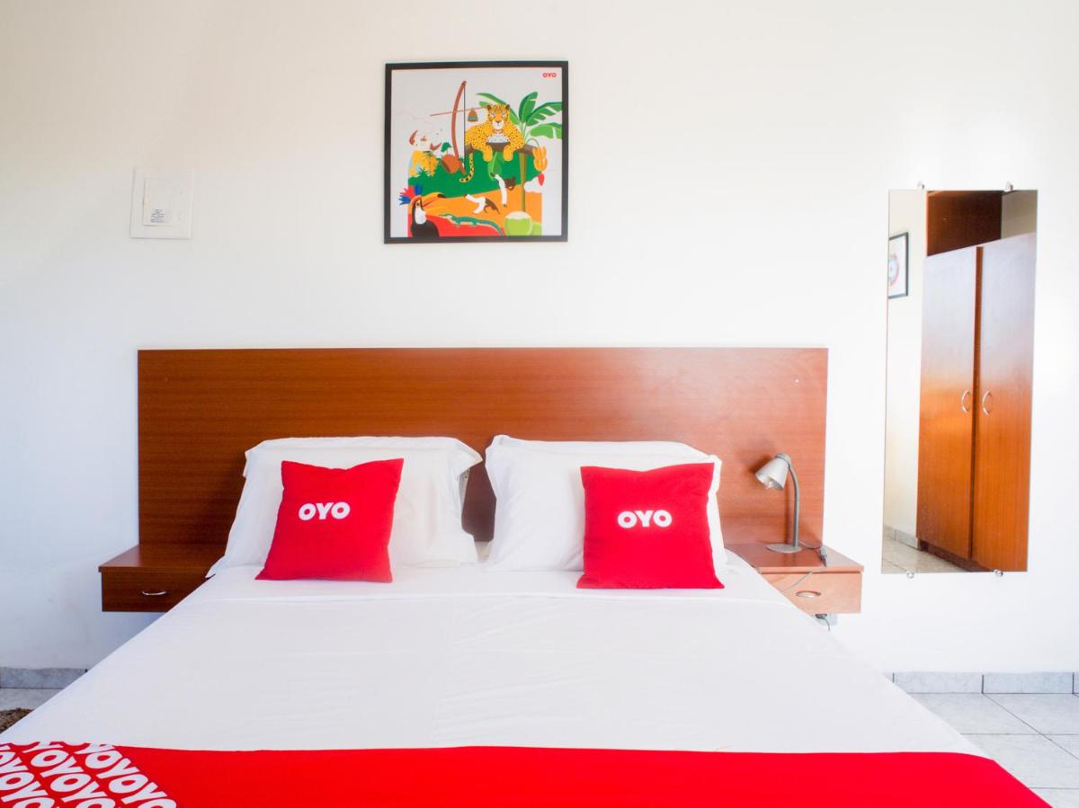 Suitetrails - OYO Athenas Apart Hotel