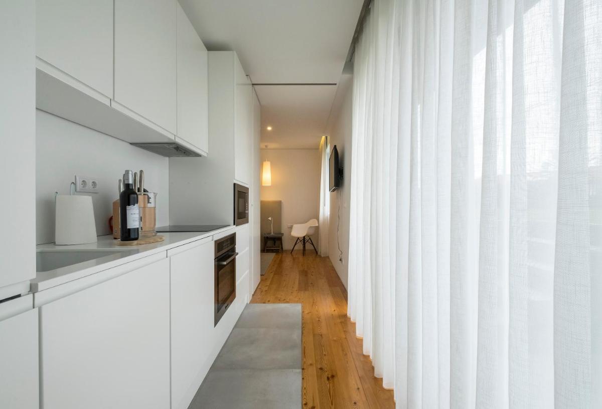 A cozinha ou kitchenette de Aqua - Pópulo Eco Village