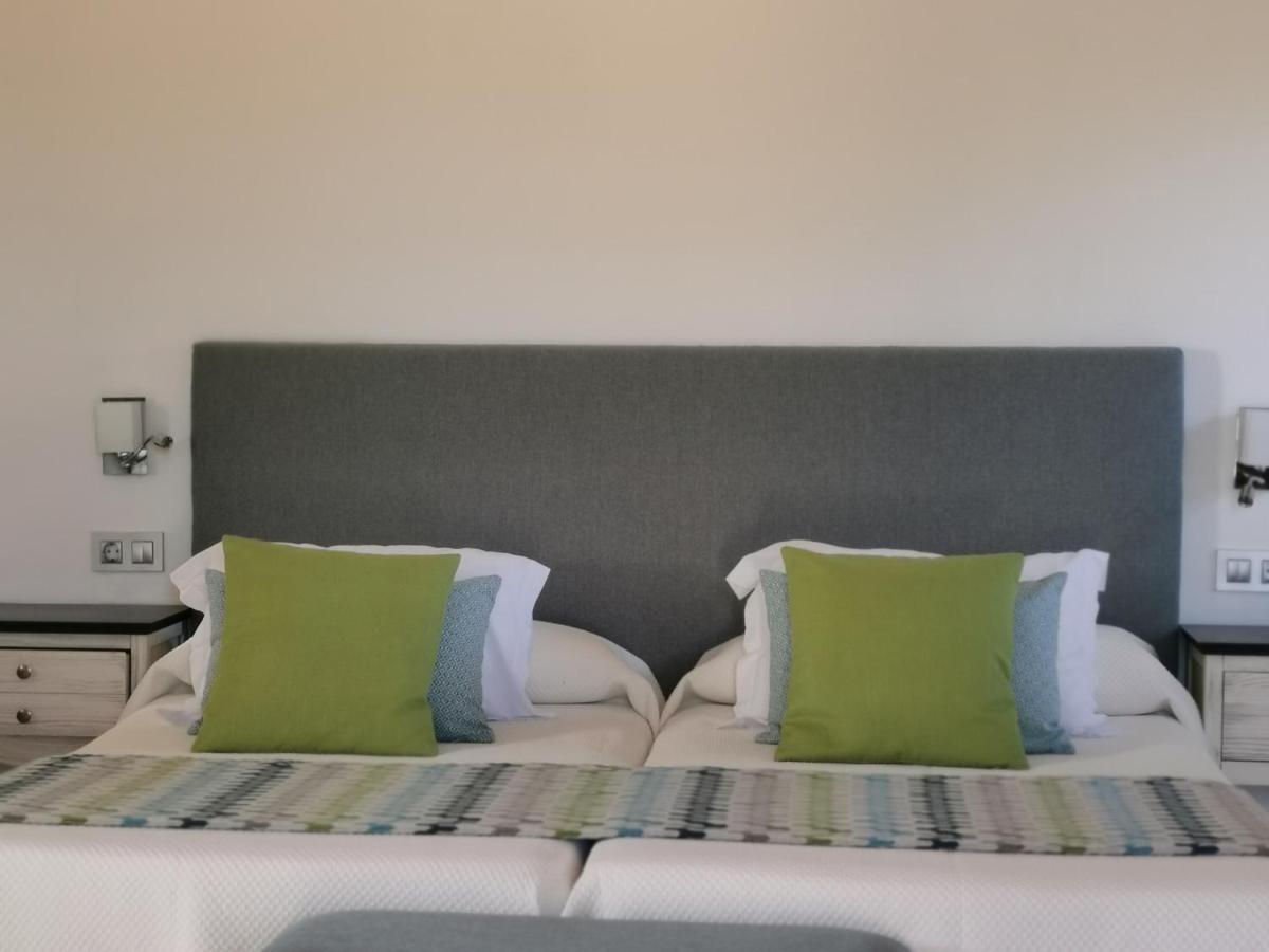 Cama o camas de una habitación en Bennoc Petit Hotel - Only Adults