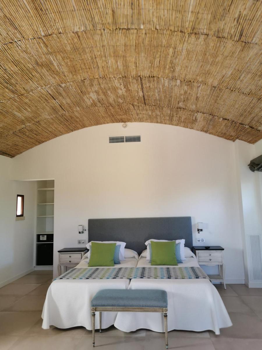 Cama o camas de una habitación en Bennoc Petit Hotel - Only Adults