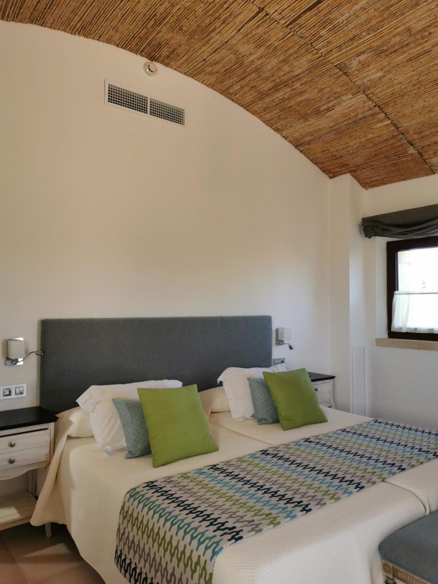 Cama o camas de una habitación en Bennoc Petit Hotel - Only Adults
