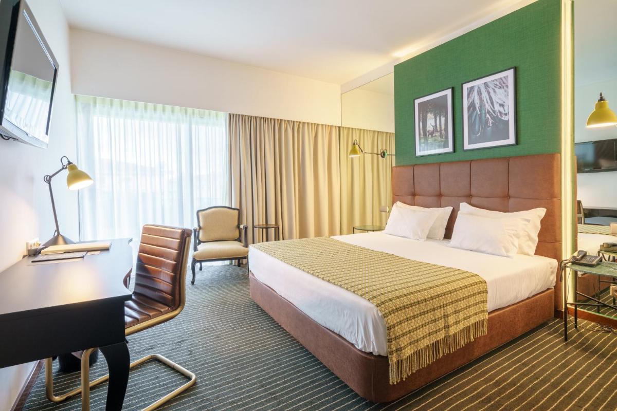 Uma cama ou camas num quarto em Monte Real - Hotel, Termas & Spa