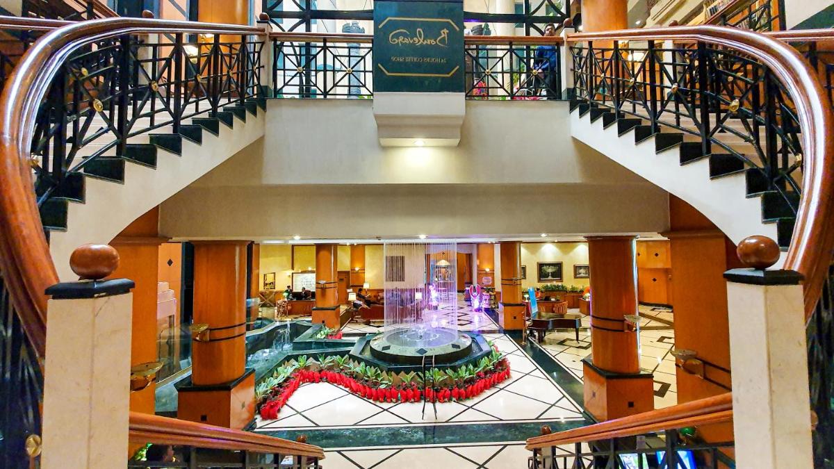 an overhead view of a building with a spiral staircase at The Orchid Hotel Mumbai Vile Parle in Mumbai