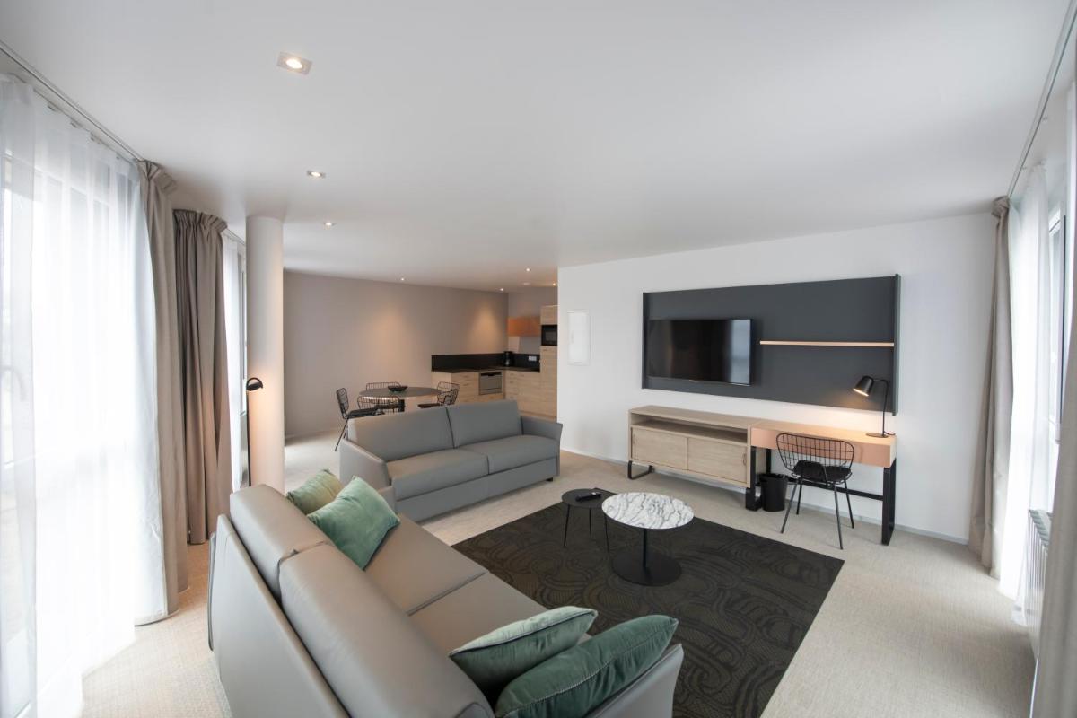 Coin salon dans l'établissement Aparthotel & Spa Adagio Vannes