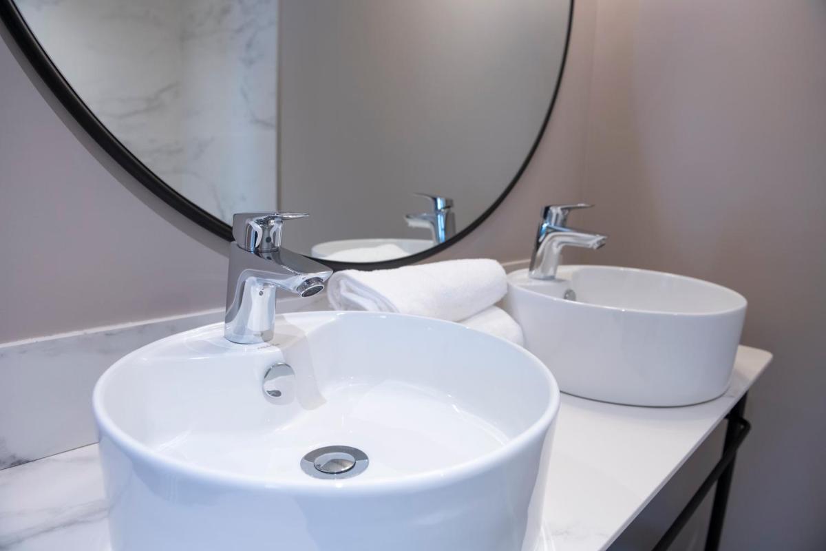 Salle de bains dans l'établissement Aparthotel & Spa Adagio Vannes
