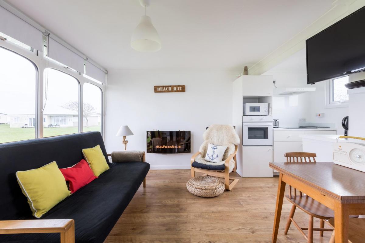 The Beach Huts - Housity