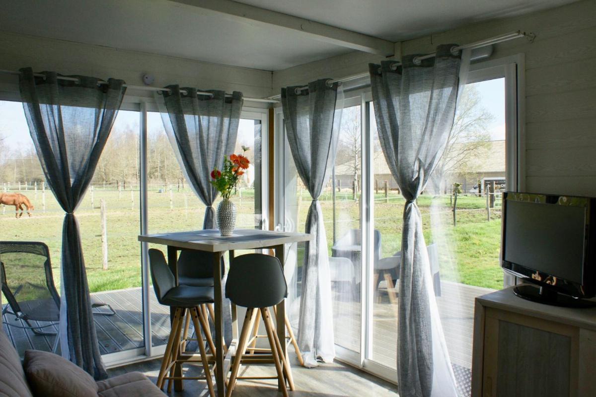Cottage tout confort au milieu des chevaux - Housity