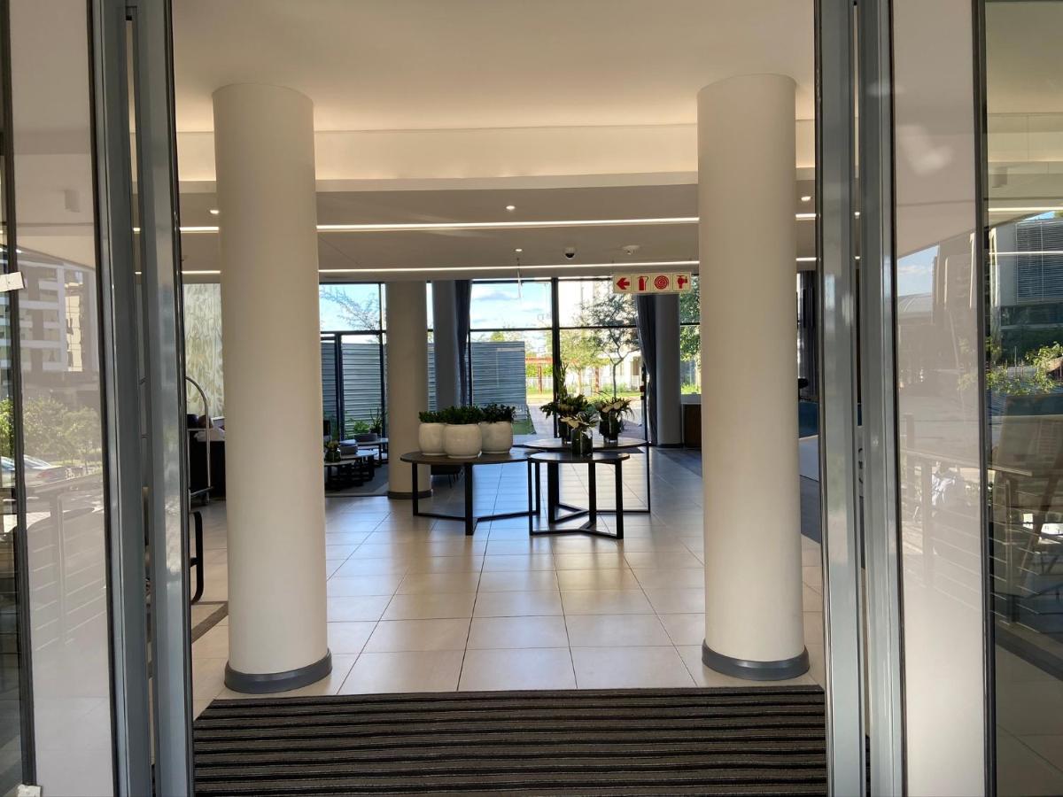 Menlyn Maine Trilogy Apartment 208 - Housity