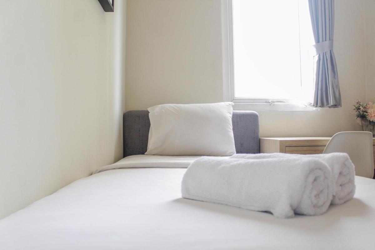 Homey 2BR Apartment at Grand Palace Kemayoran By Travelio - Housity