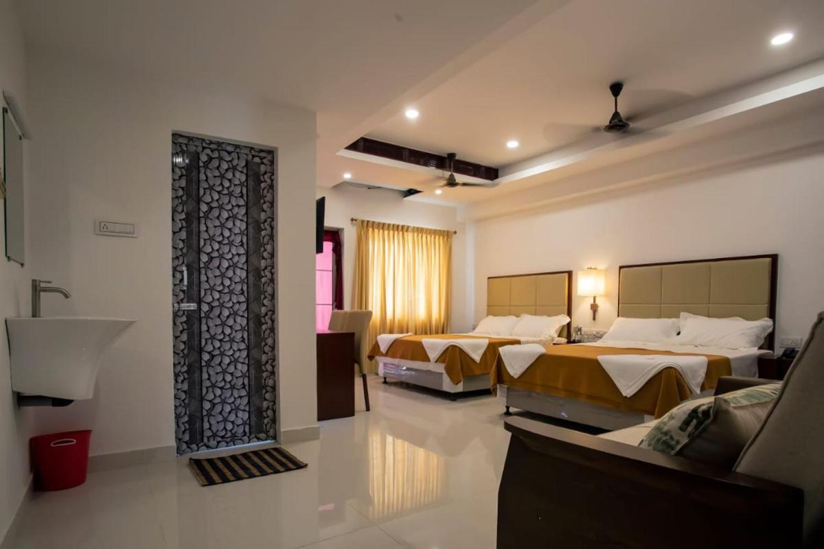 Hotel Viswa Grand - Housity