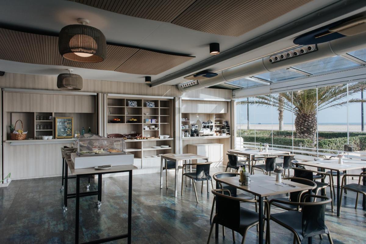 Un restaurante o sitio para comer en Hotel Neptuno Playa & Spa