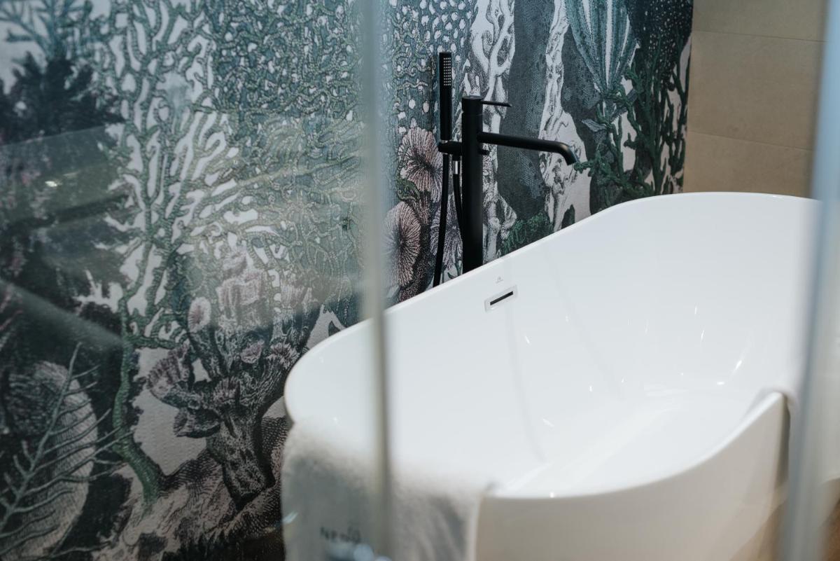 Un baño de Hotel Neptuno Playa & Spa