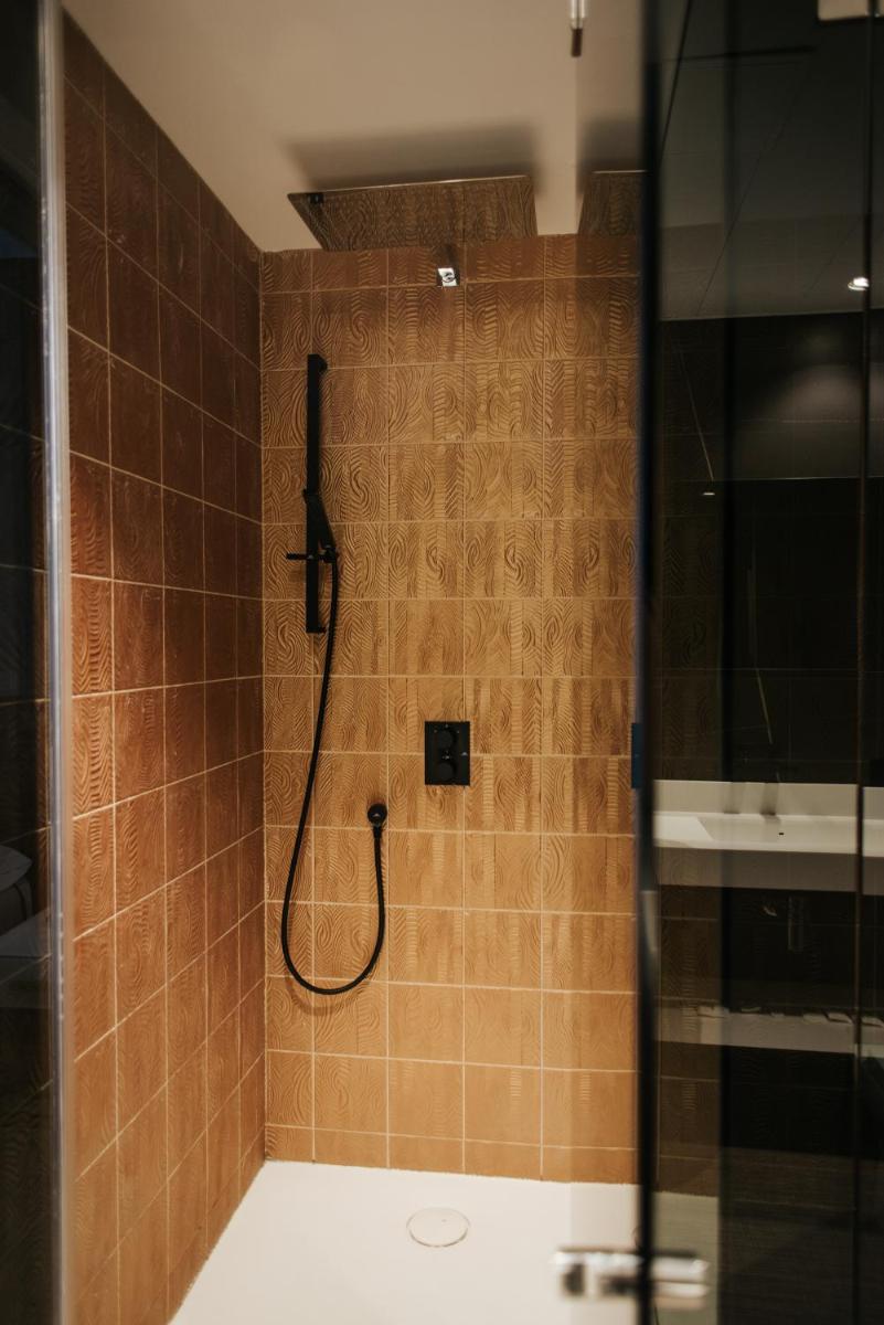 Un baño de Hotel Neptuno Playa & Spa