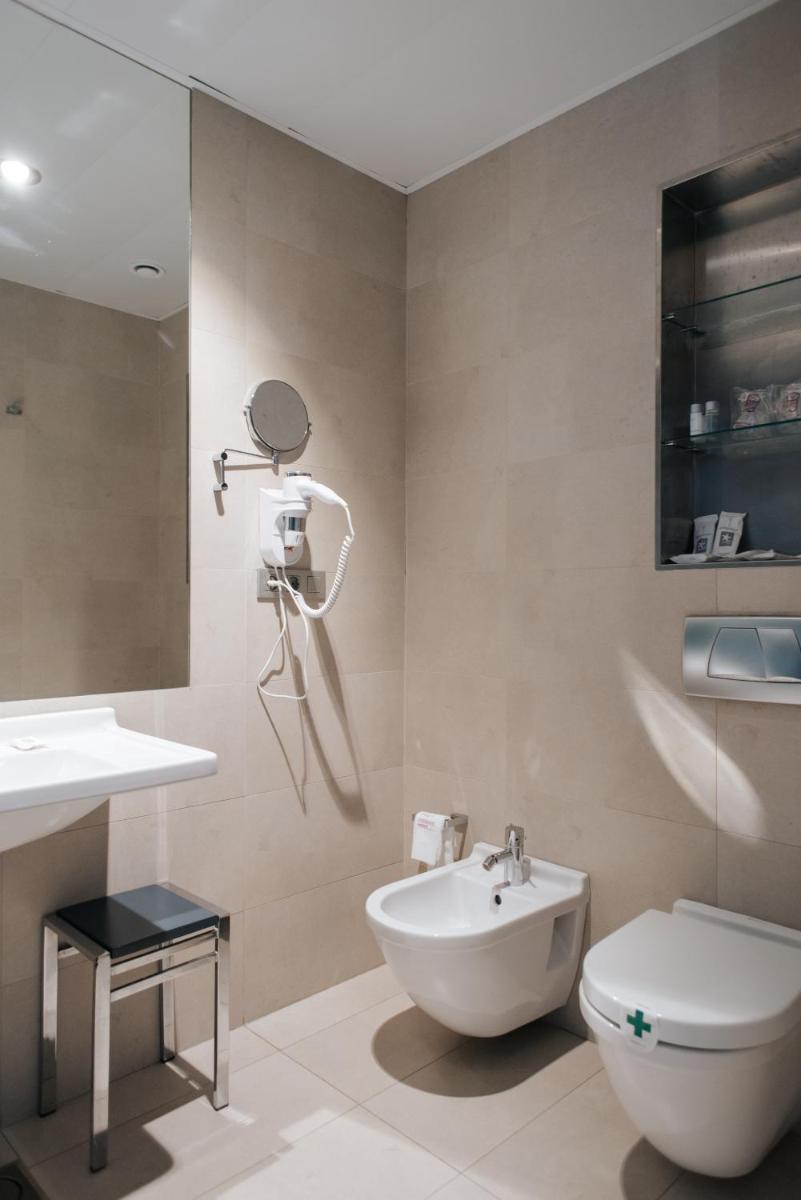 Un baño de Hotel Neptuno Playa & Spa