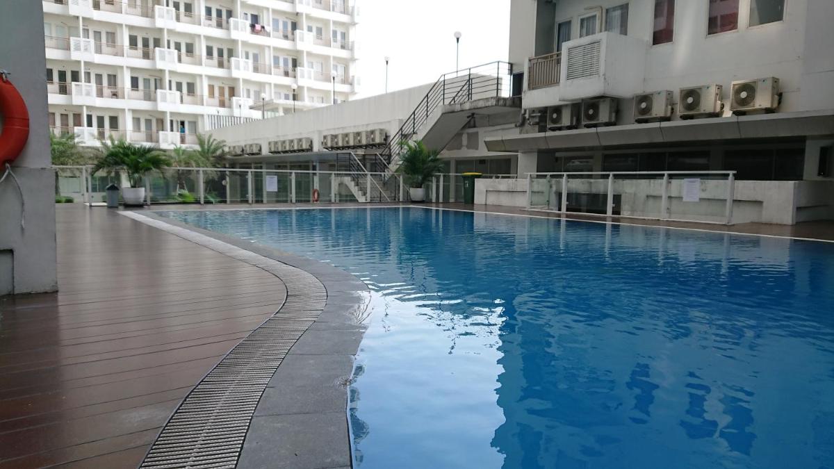 Kozy Room Sentul Tower Apartemen - Hizvo