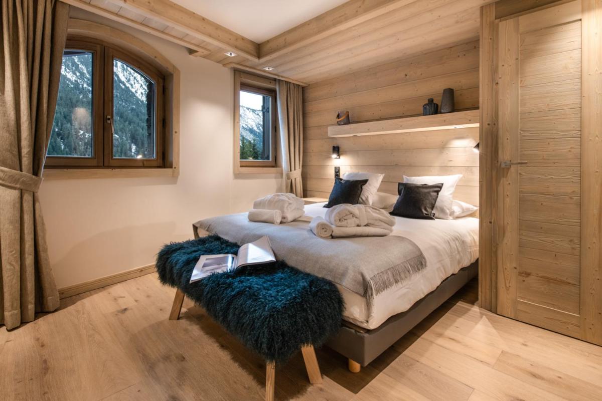 Un ou plusieurs lits dans un hébergement de l'établissement Manali Lodge by Alpine Resorts