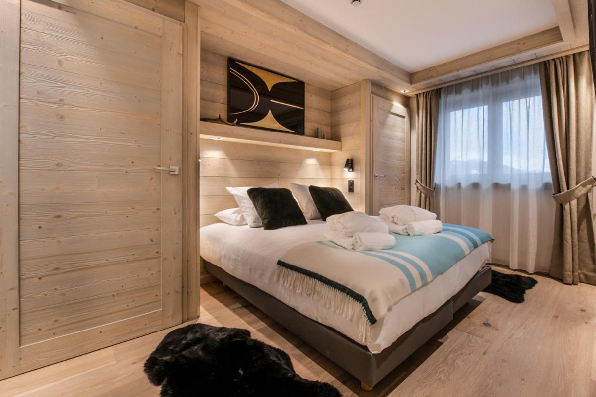 Un ou plusieurs lits dans un hébergement de l'établissement Manali Lodge by Alpine Resorts