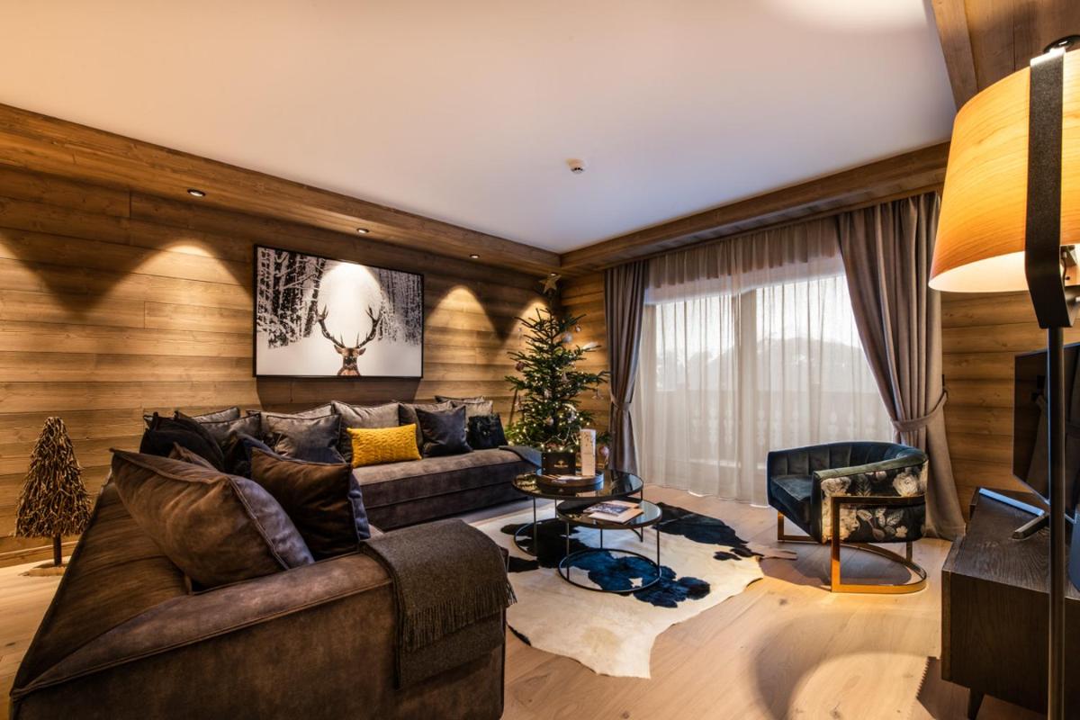 Coin salon dans l'établissement Manali Lodge by Alpine Resorts