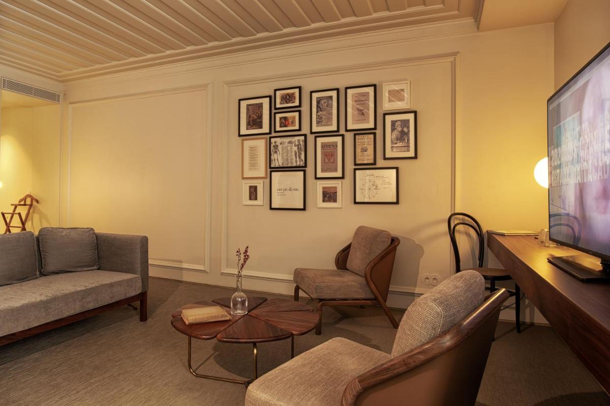 Uma área de estar em Lisboa Pessoa Hotel