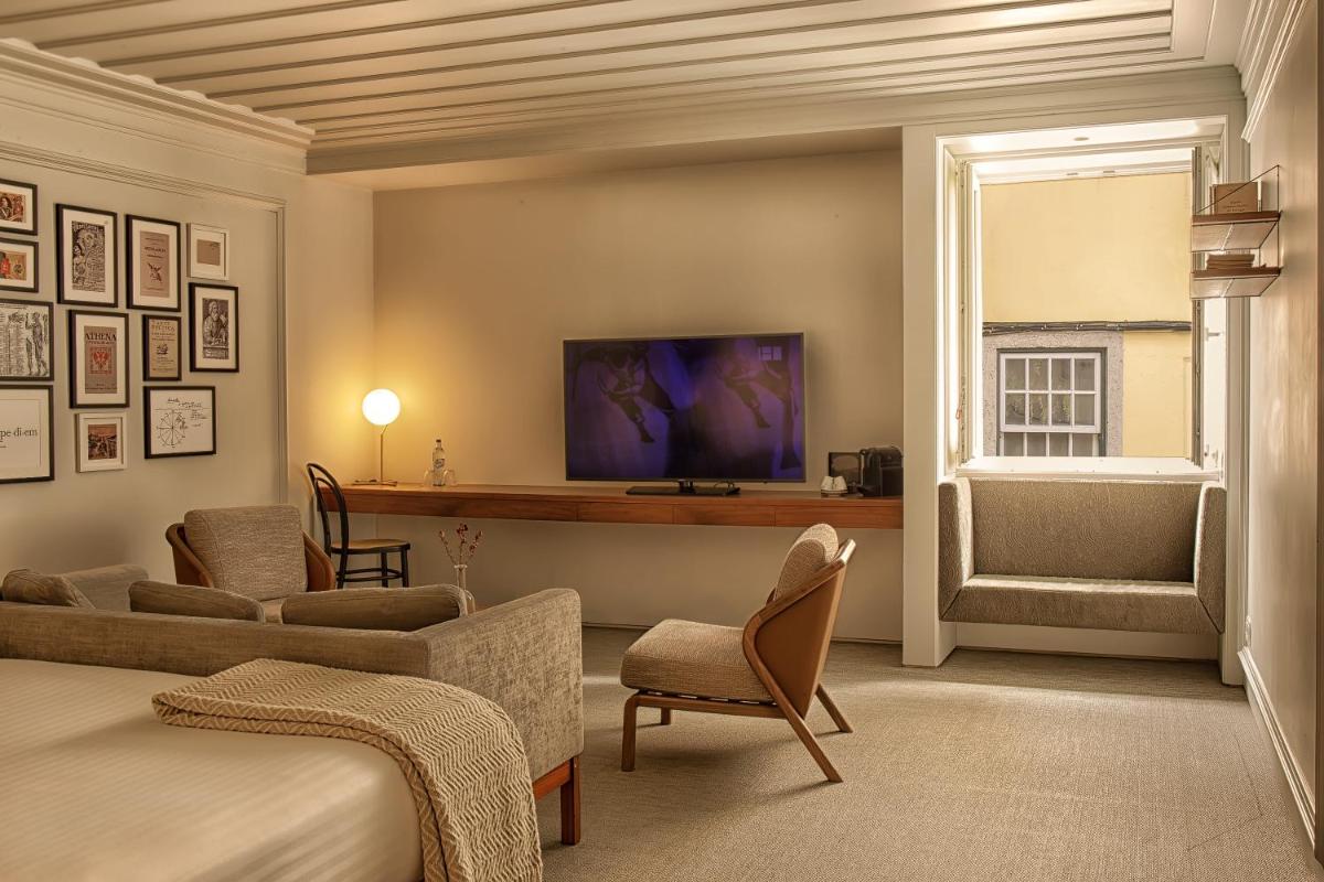 Uma televisão e/ou sistema de entretenimento em Lisboa Pessoa Hotel
