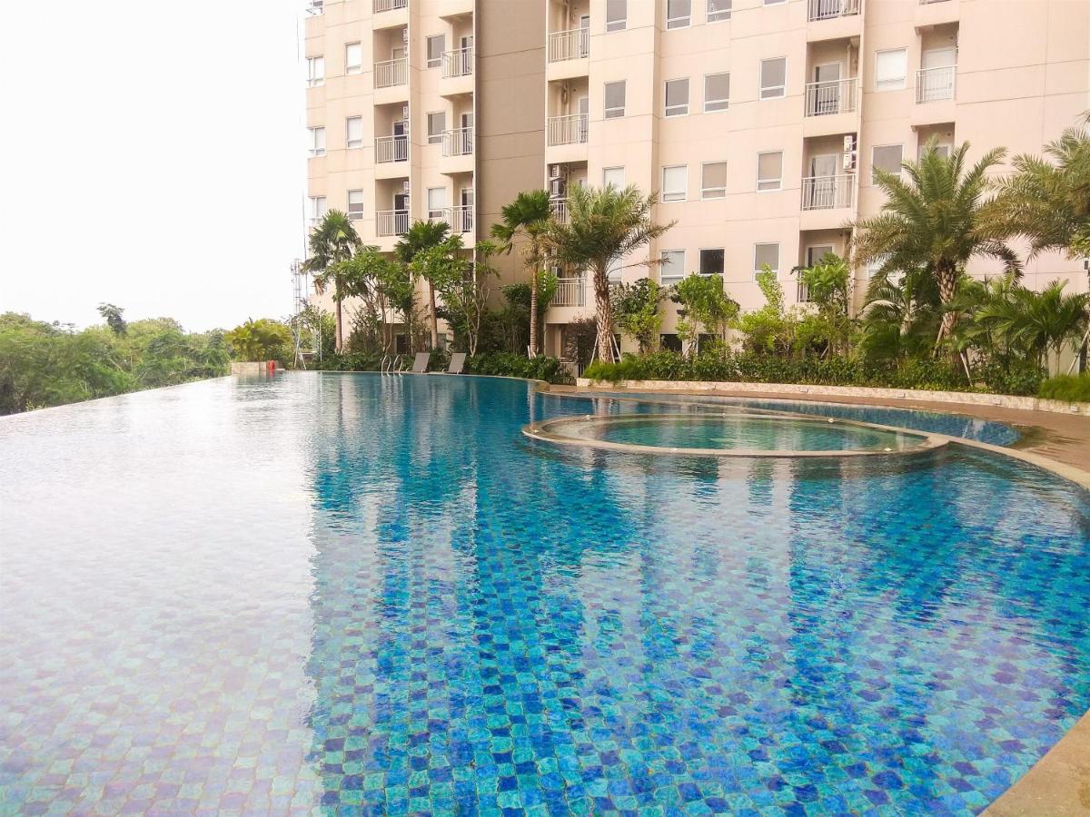 Stylish and Cozy Studio No Kitchen Apartment Mustika Golf Residence By Travelio - Housity