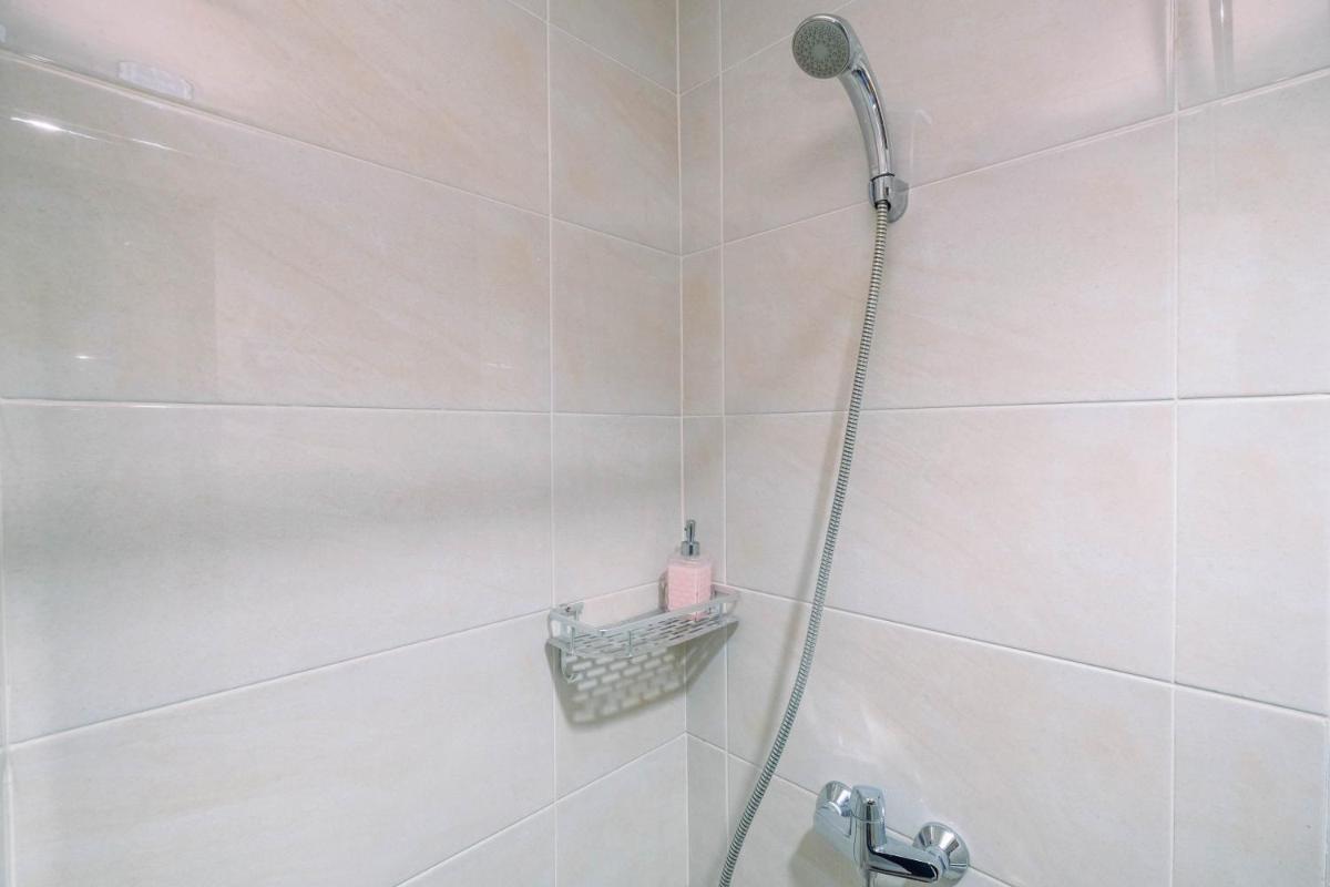 Stylish and Cozy Studio No Kitchen Apartment Mustika Golf Residence By Travelio - Housity
