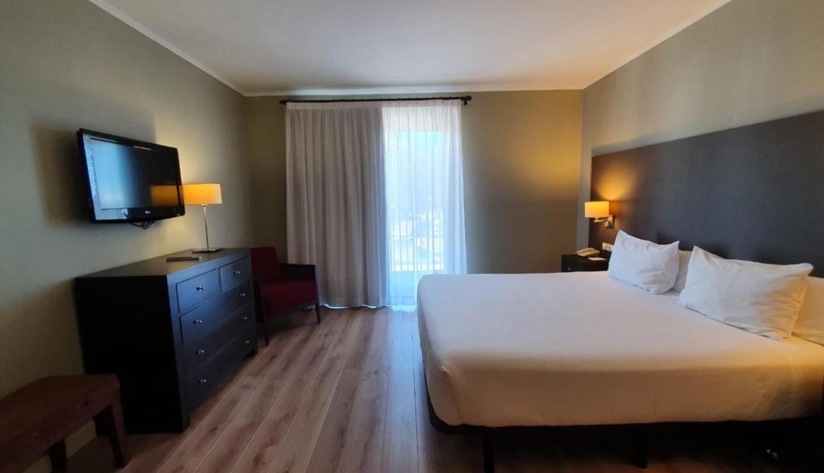 Cama o camas de una habitación en HG La Molina