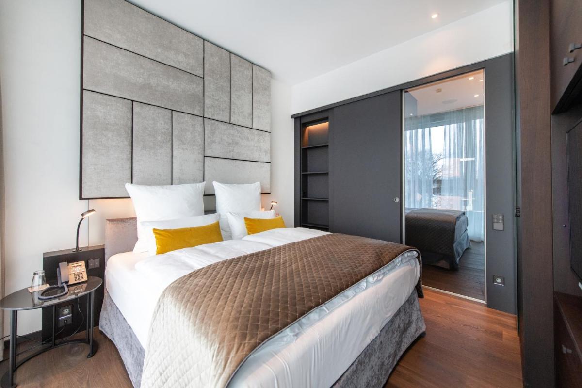 Ein Bett oder Betten in einem Zimmer der Unterkunft FÄHRHAUS Koblenz