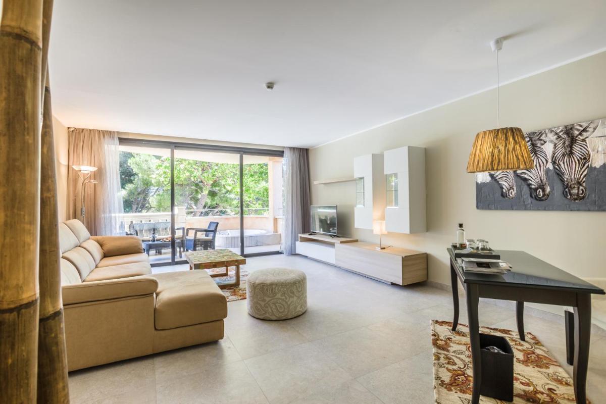 Zona de estar de Lago Garden Apart-Suites & Spa Hotel