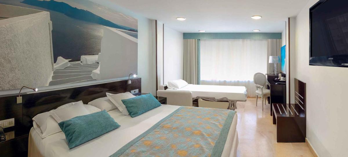 Cama o camas de una habitación en Hotel Villa del Mar