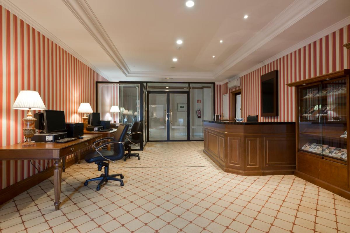 El vestíbulo o zona de recepción de Eurostars Palacio Buenavista