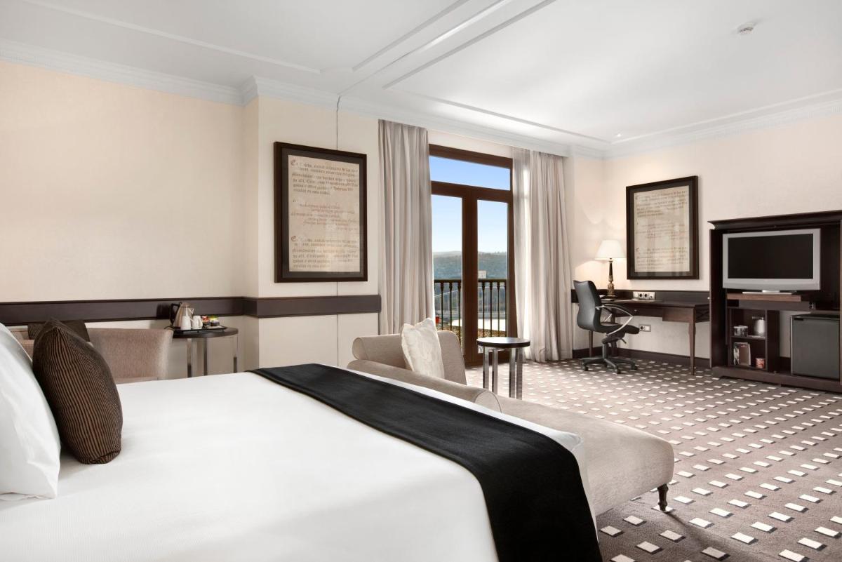 Cama o camas de una habitación en Eurostars Palacio Buenavista