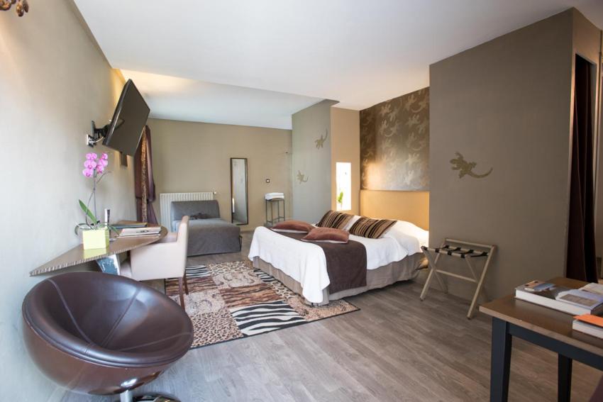 Un ou plusieurs lits dans un hébergement de l'établissement Le Castellas Hotel & SPA - TERITORIA
