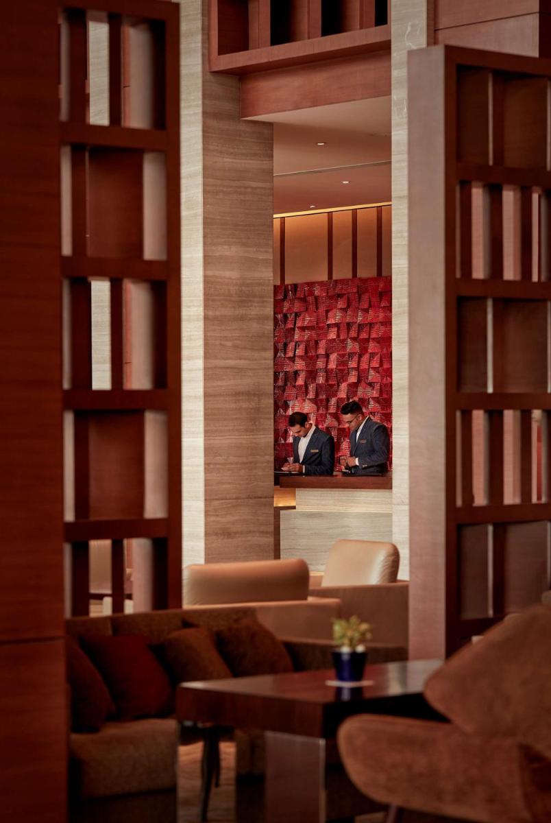 a living room with a couch and a table at Hyatt Regency Chandigarh in Chandīgarh