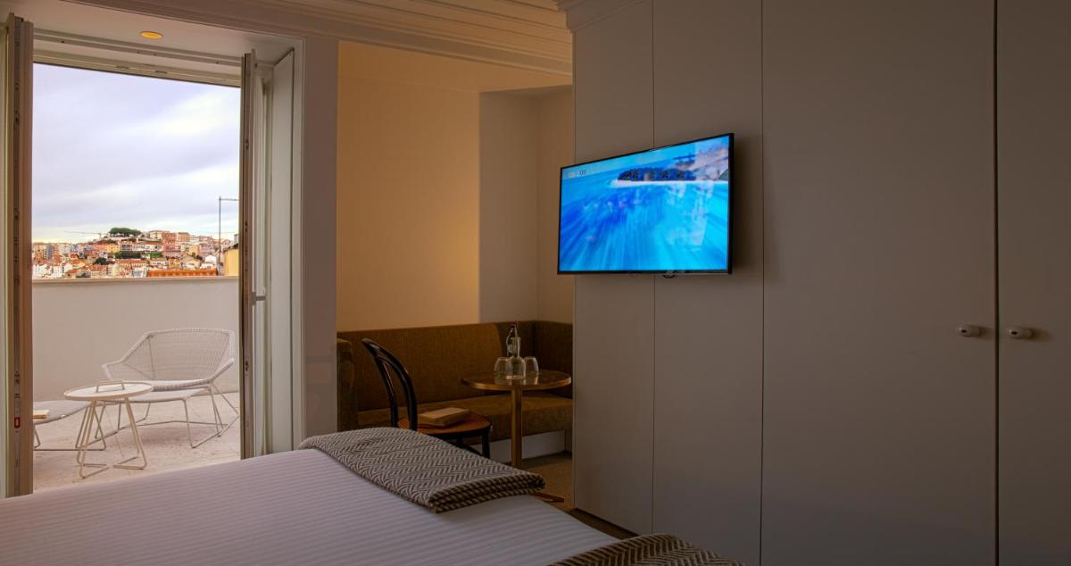 Uma televisão e/ou sistema de entretenimento em Lisboa Pessoa Hotel