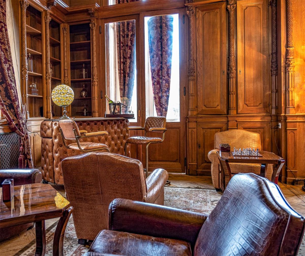 Coin salon dans l'établissement Château de Tressé