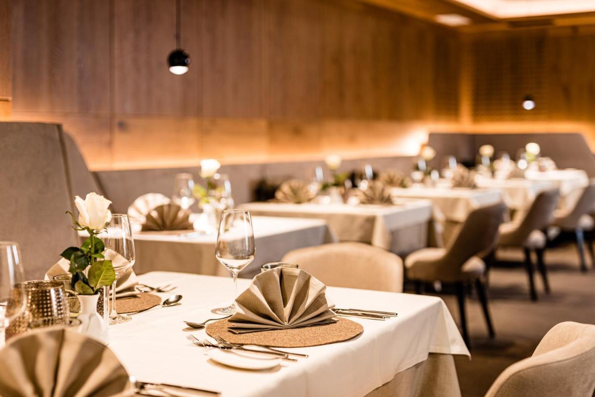 Hotel Touring Dolomites - Housity