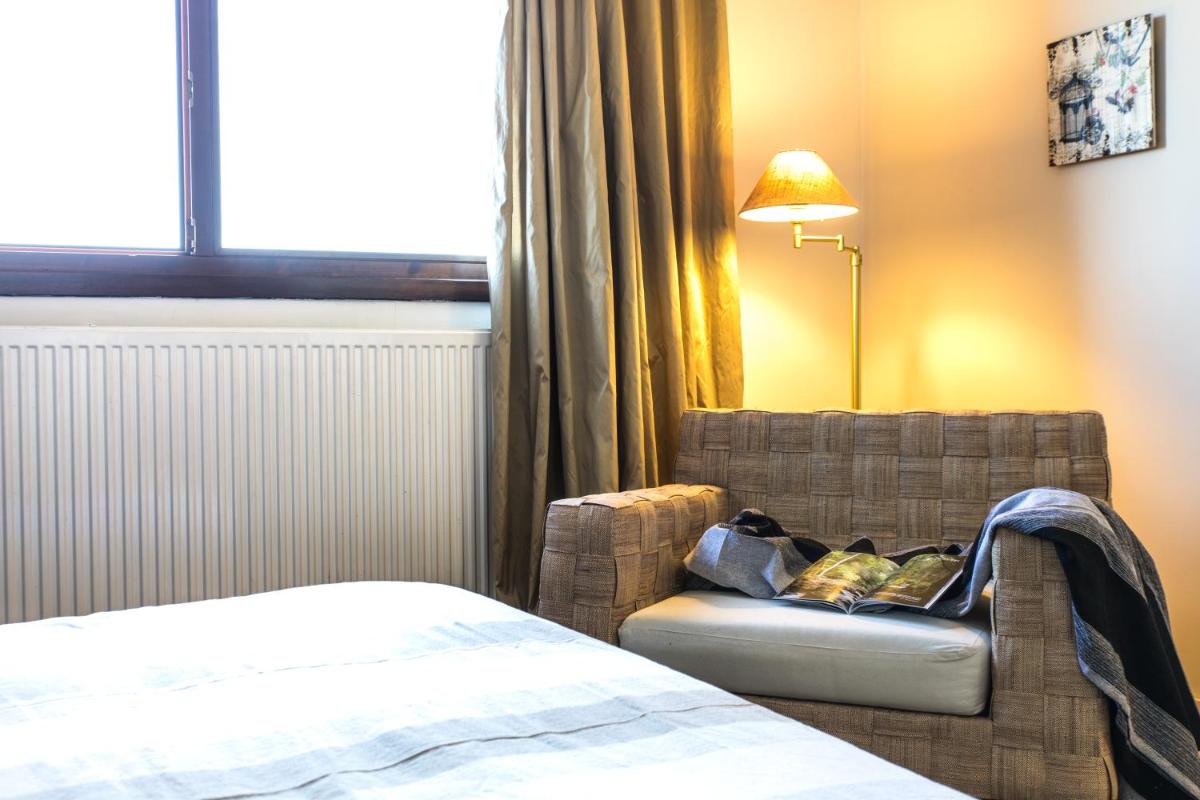 Cama o camas de una habitación en Hotel Cardamomo Sigüenza