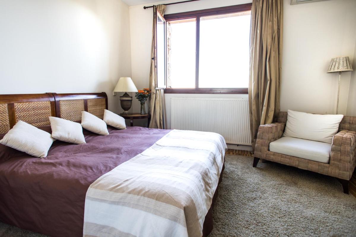 Cama o camas de una habitación en Hotel Cardamomo Sigüenza