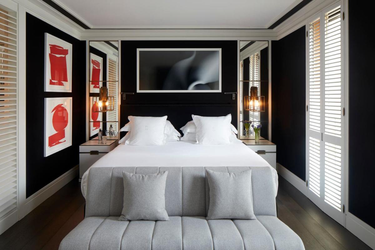 Cama o camas de una habitación en Seventy Barcelona
