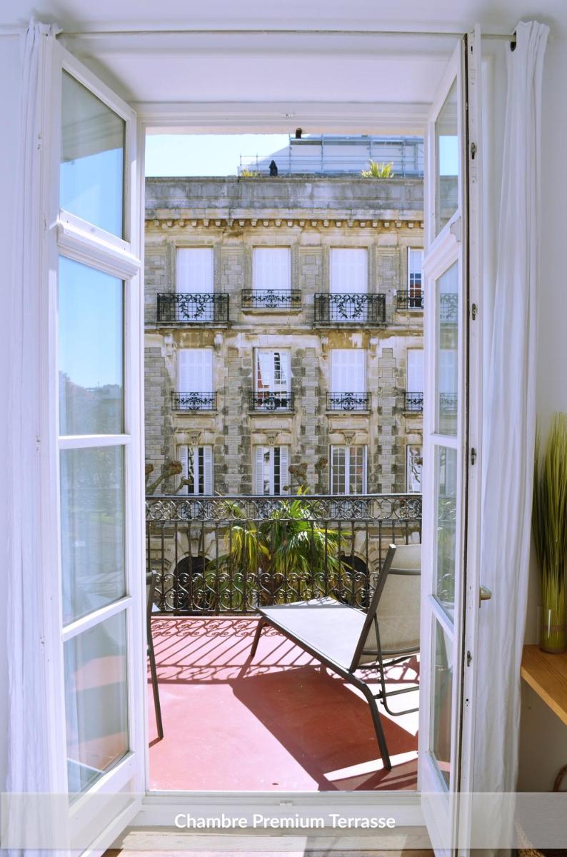 Balcon ou terrasse dans l'établissement Hôtel & Espace Bien-être La Maison du Lierre