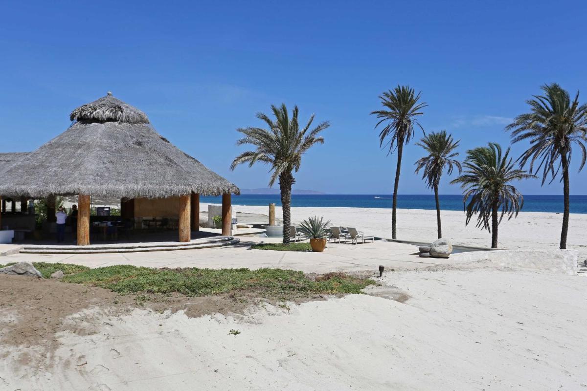 Resort-Style Beachfront Getaway with Pool and Balcony! - Housity
