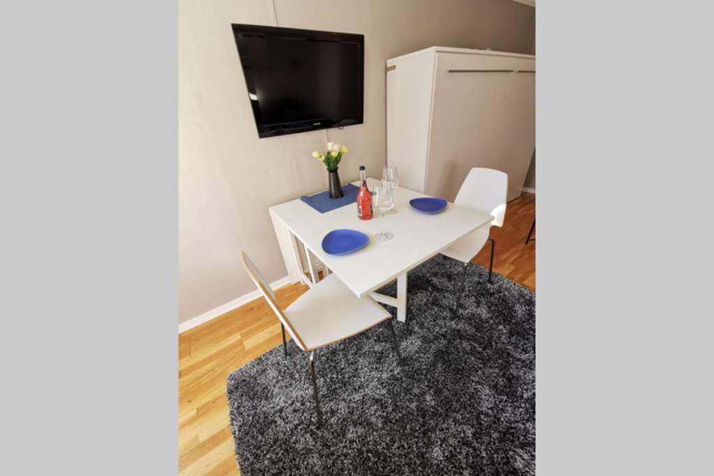 Stilren studiolägenhet på 20 kvm nära havet och centrum! Stationsterrassen 7 - Housity