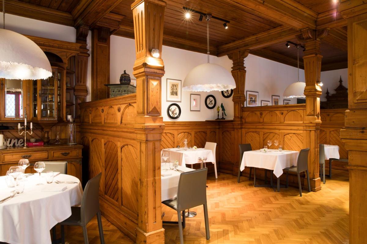 Restaurant ou autre lieu de restauration dans l'établissement Relais & Châteaux La Maison Des Têtes