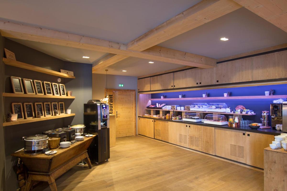 Cuisine ou kitchenette dans l'établissement Hôtel Avancher